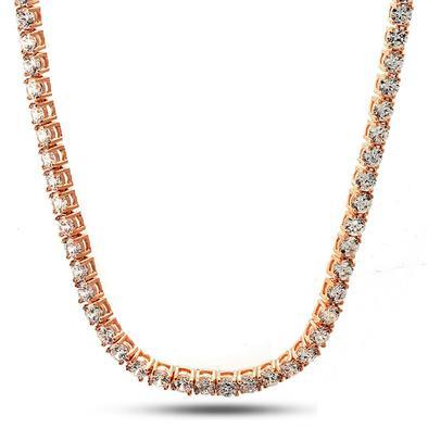 ROCK 4MM One Row Tennis Chain featuring sparkling cubic zirconia stones set in a brass metal chain, elegantly displayed against a soft background.