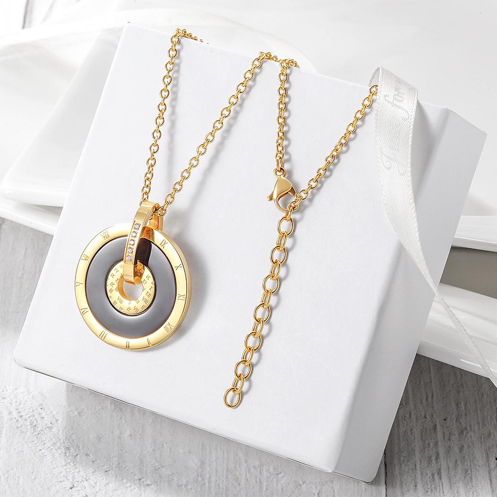 Elegant Roman Numerals Pendant Necklace made of stainless steel with gold plating, showcasing a unique design.