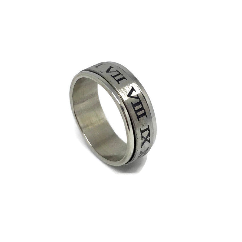 A stylish Roman Numerals Spinning Band Ring made of stainless steel, showcasing its unique spinning feature and bold 1.8cm width.