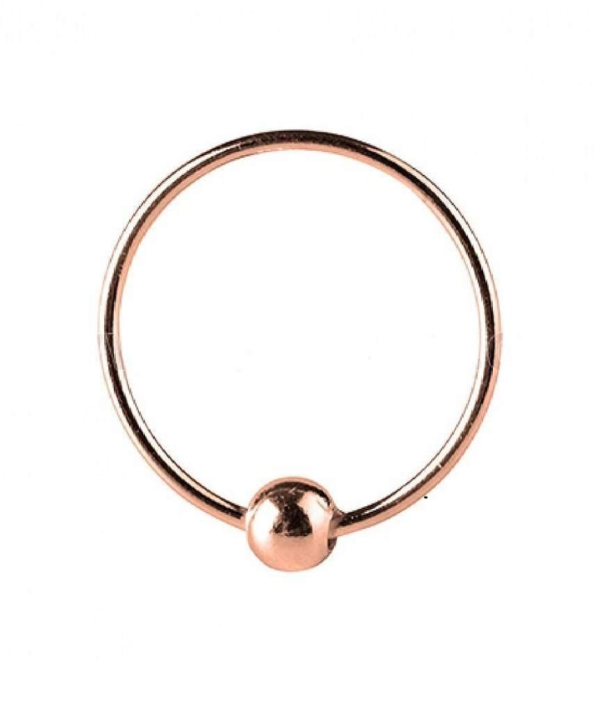 A delicate rose gold nose ring made of sterling silver, showcasing its minimalist design and elegant finish.