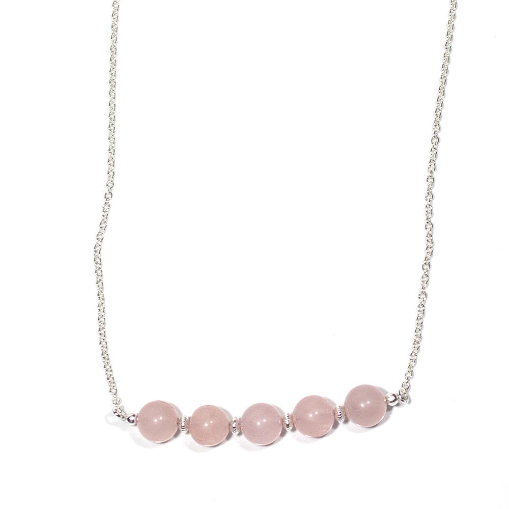 A chic Rose Quartz Bead Bar Necklace featuring 10mm soft pink rose quartz beads, silver-plated brass clasp, and a 20-inch length with extender.