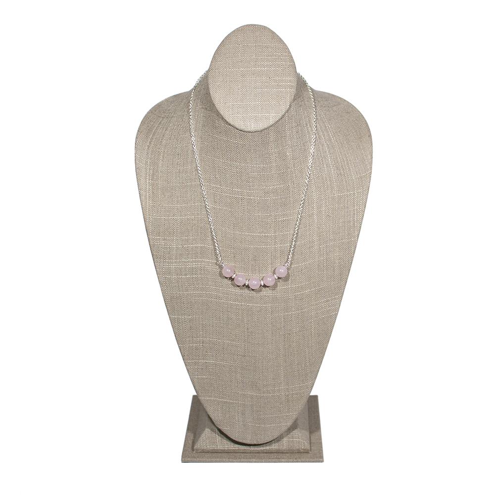 A chic Rose Quartz Bead Bar Necklace featuring 10mm soft pink rose quartz beads, silver-plated brass clasp, and a 20-inch length with extender.