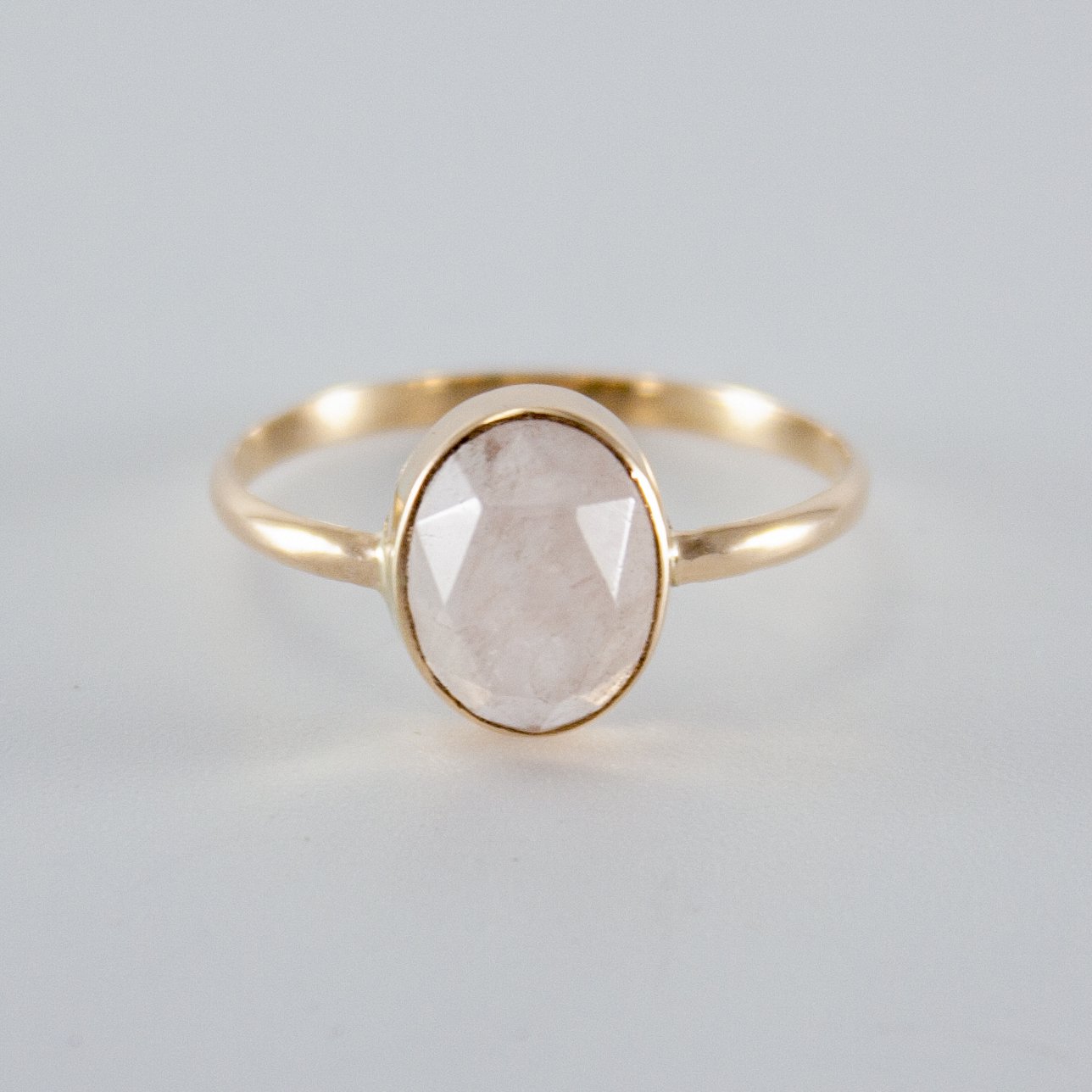 Rose Quartz Oval Open Bezel Ring in 14k Gold Filled, featuring a unique rose cut gemstone set in an elegant open bezel design.