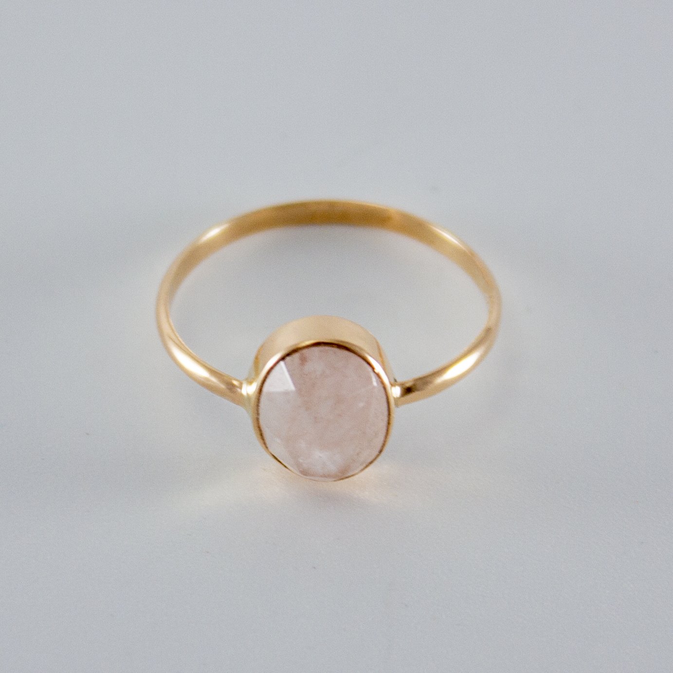 Rose Quartz Oval Open Bezel Ring in 14k Gold Filled, featuring a unique rose cut gemstone set in an elegant open bezel design.