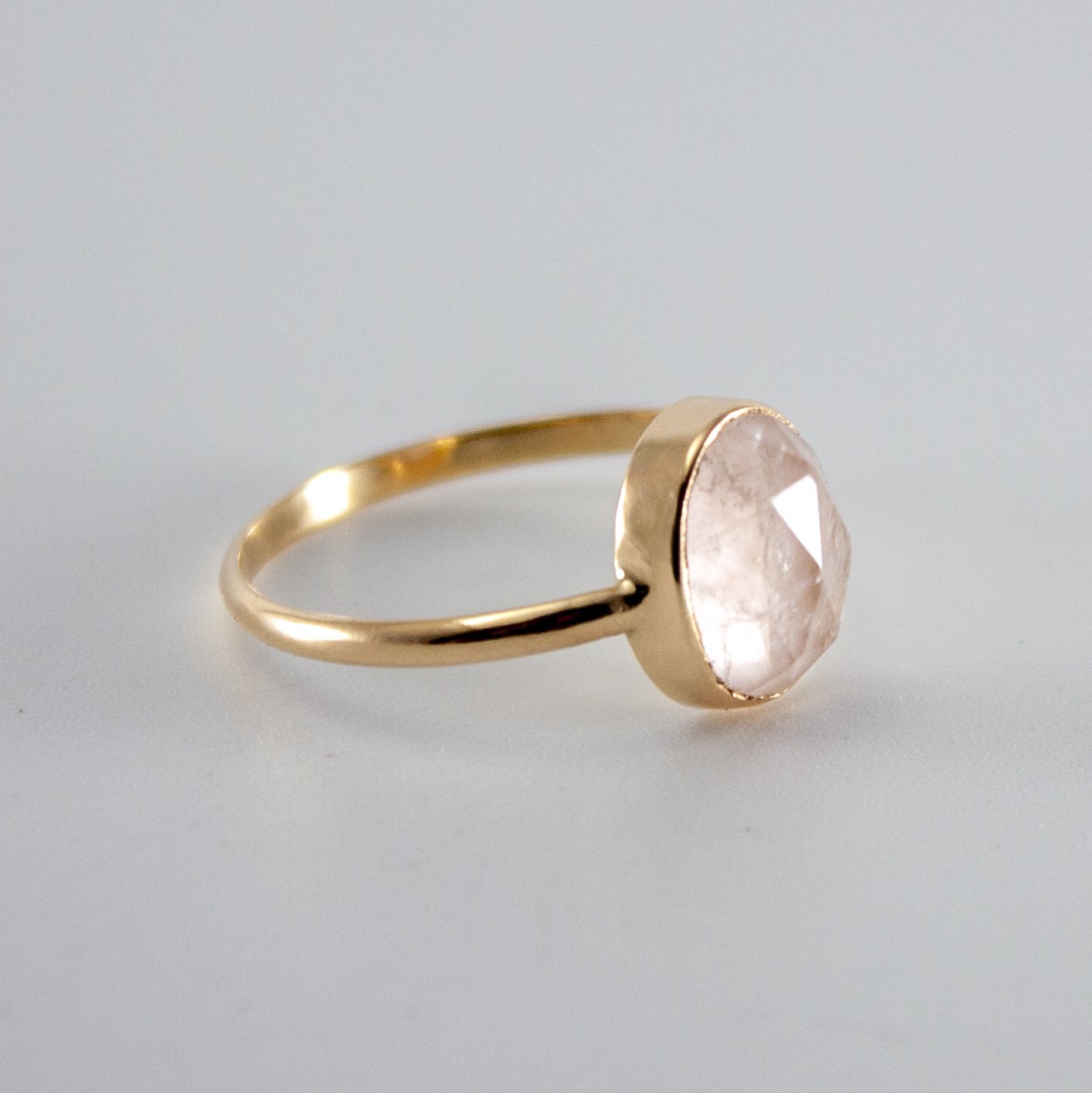 Rose Quartz Oval Open Bezel Ring in 14k Gold Filled, featuring a unique rose cut gemstone set in an elegant open bezel design.