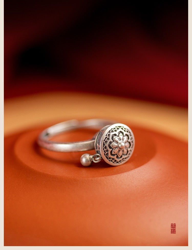 A detailed view of the Rotatable Prayer Wheel Open Ring made from copper and S925 silver, showcasing its adjustable design and intricate craftsmanship.