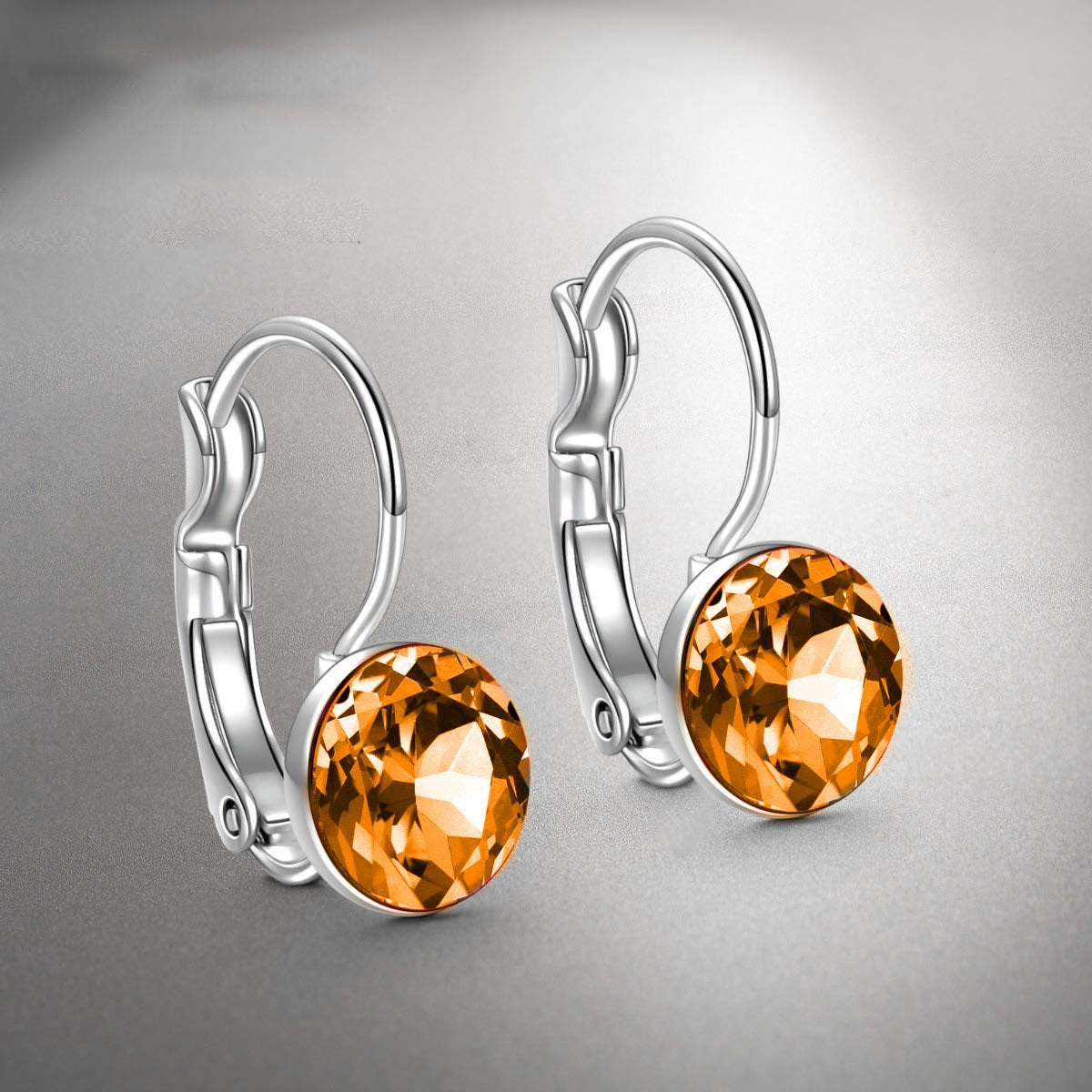 Round Baby 0.3" Crystals Leverback Earrings featuring 18K white gold plating and Austrian crystals, designed in Italy.