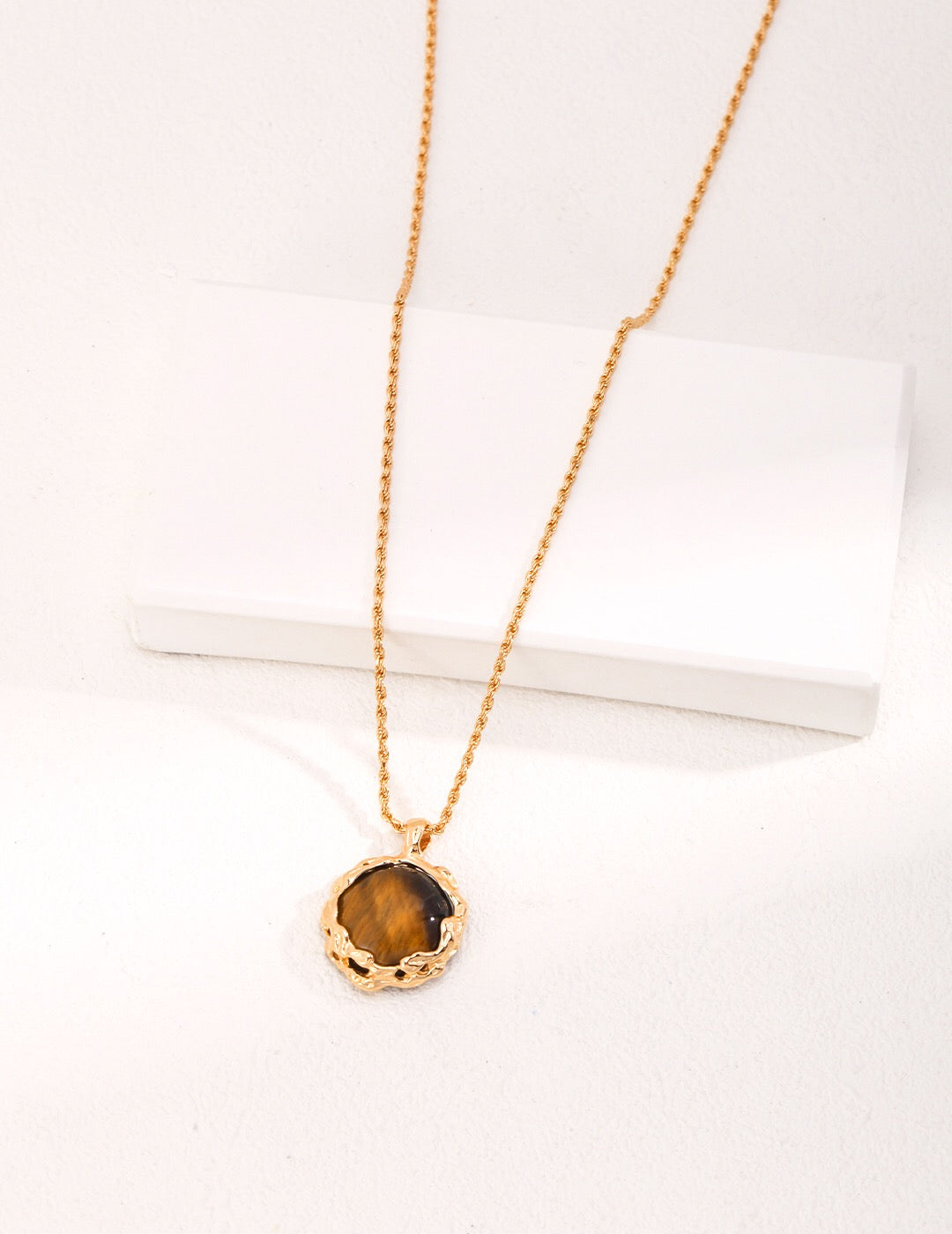 Round Charm Tiger Eye Stone Pendant Necklace featuring a gold vermeil chain and a stunning tiger eye stone pendant.