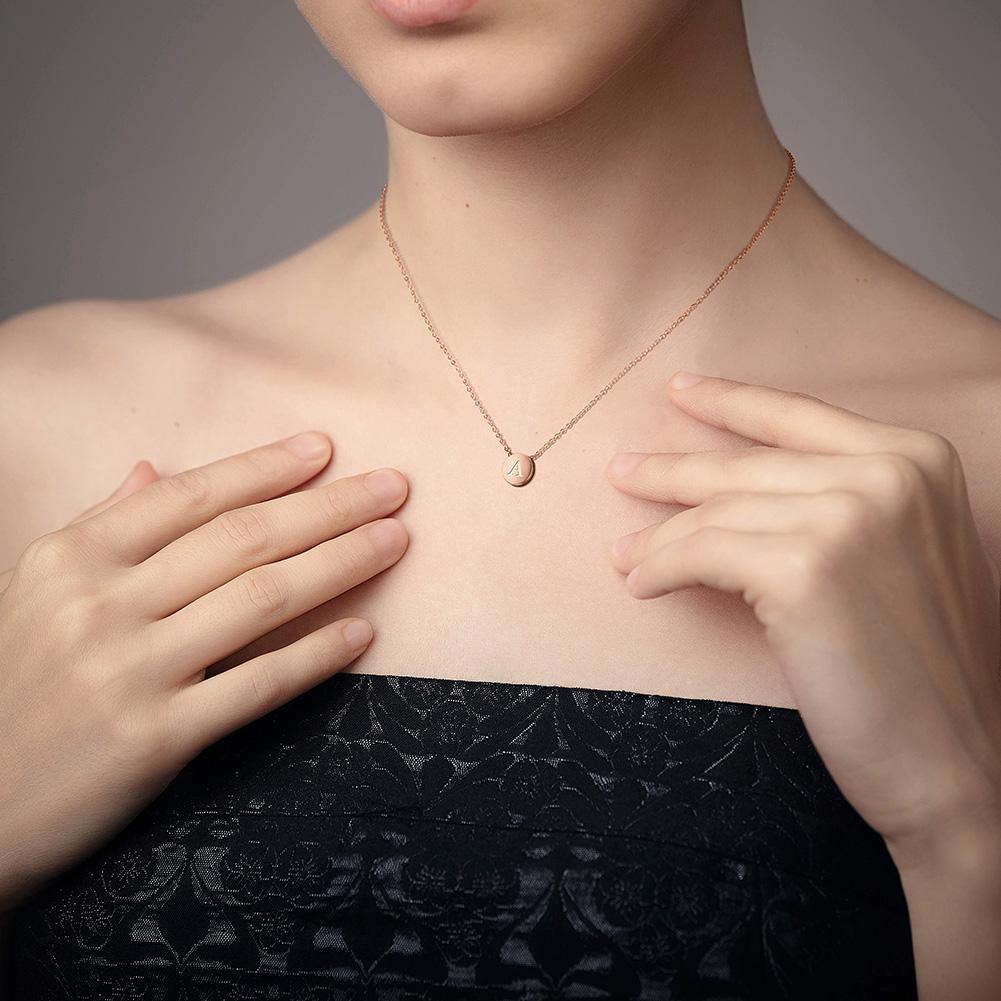 Round Opal Pendant Necklace in Rose Gold, featuring a stunning opal centerpiece and elegant rose gold chain.