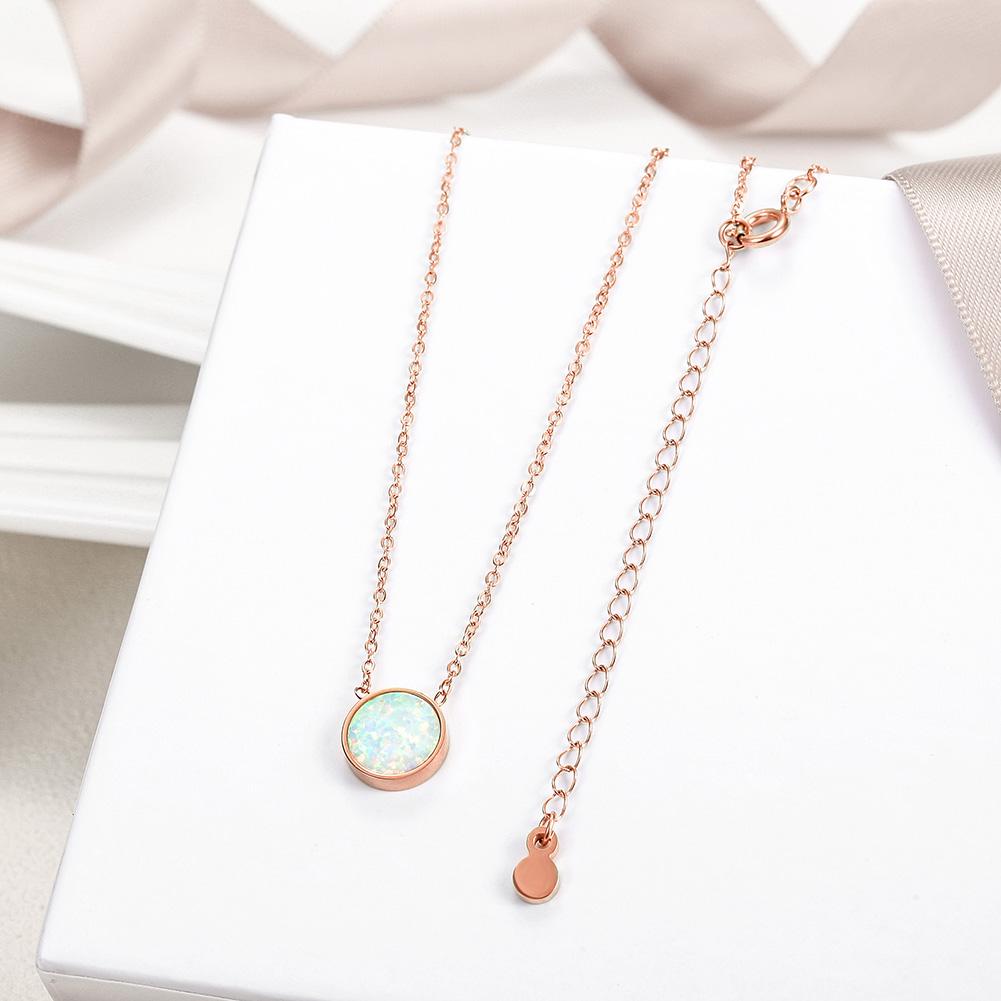 Round Opal Pendant Necklace in Rose Gold, featuring a stunning opal centerpiece and elegant rose gold chain.