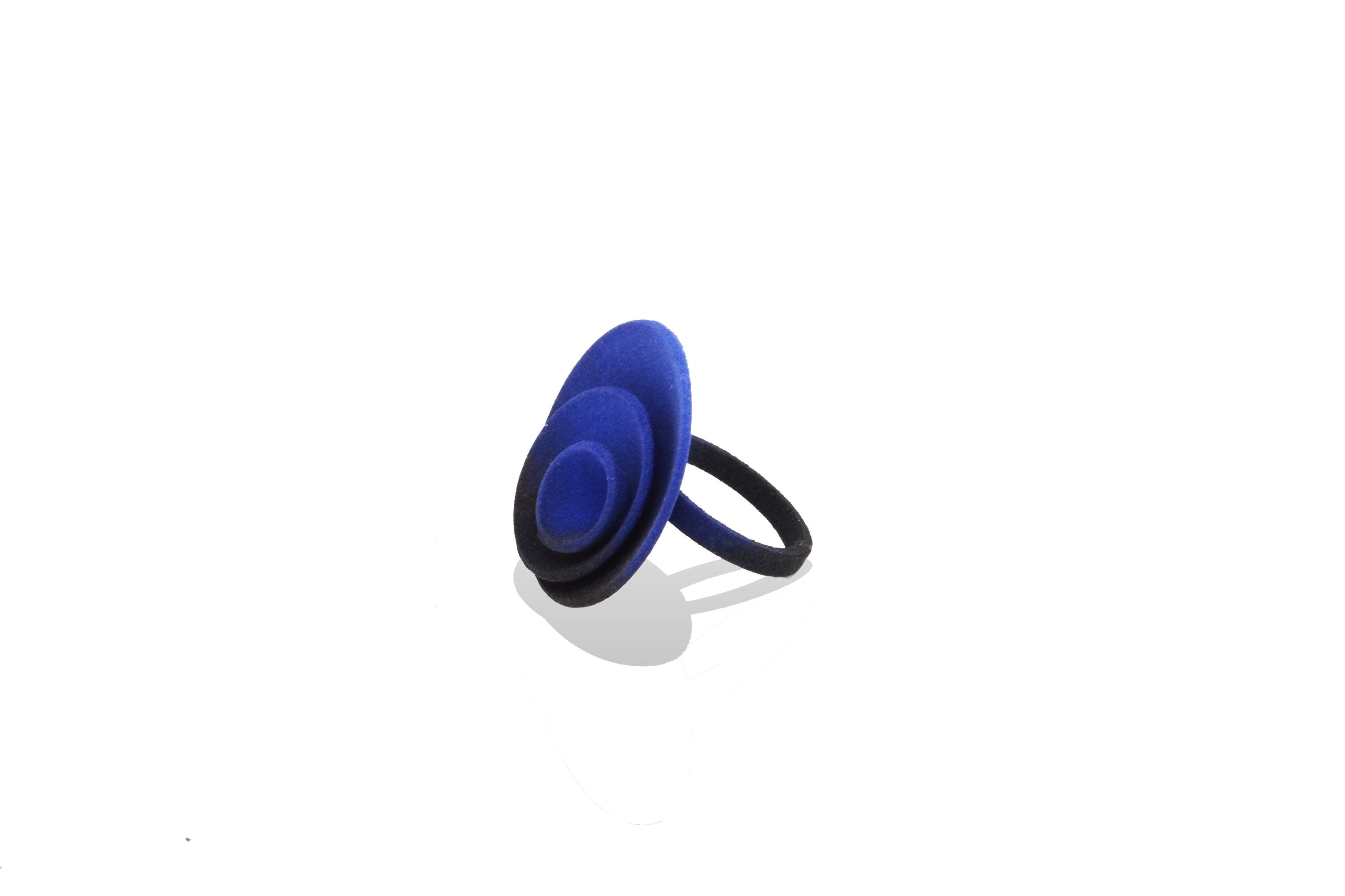 Colorful Round Ring from the Vertigo Collection featuring concentric shapes and a smooth matte finish, made from lightweight 3D printed nylon.