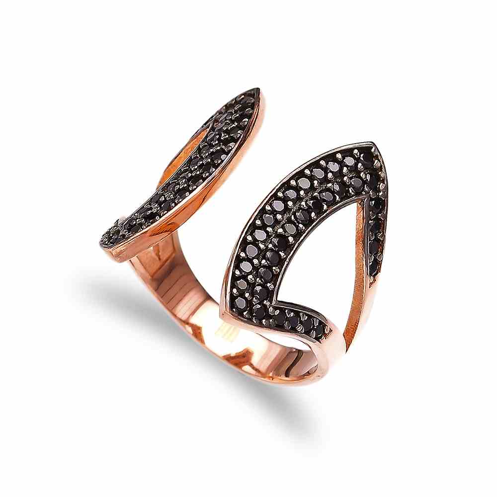 The ROXIE Ring featuring black cubic zirconias set in a rose gold plated sterling silver cuff, showcasing a chic retro-inspired design.