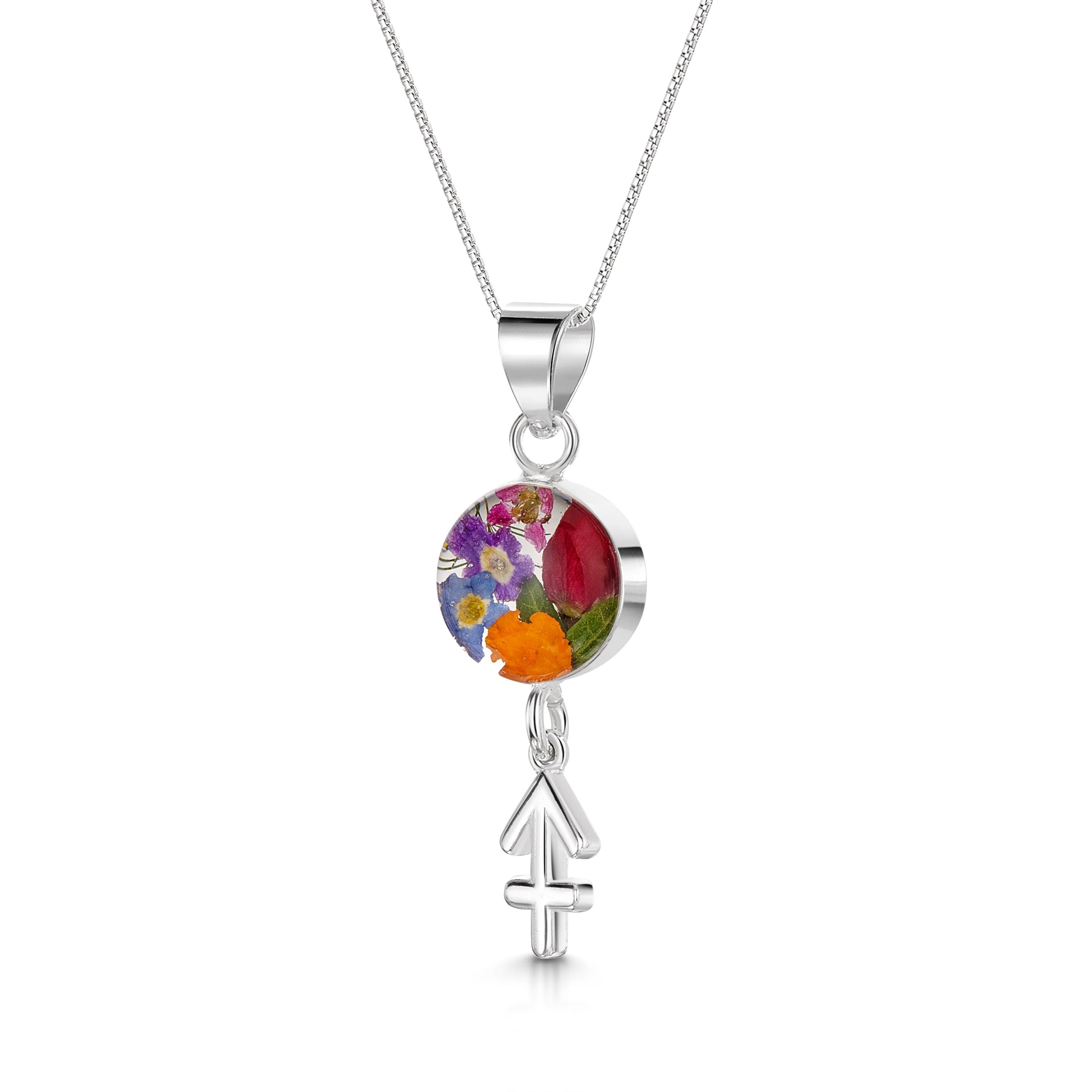 Sagittarius Necklace featuring a sterling silver pendant with real flowers and a detailed zodiac charm, showcasing elegance and individuality.