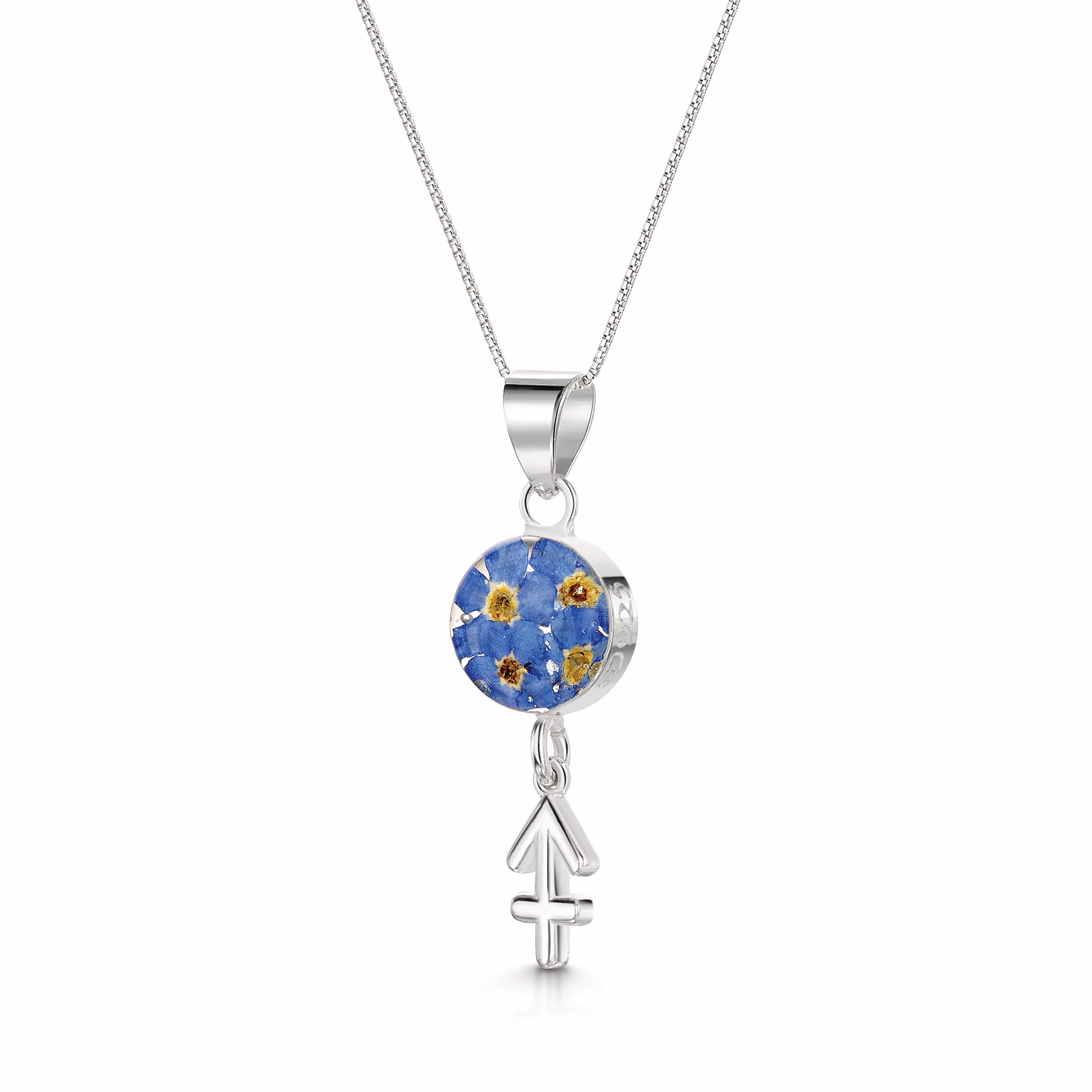 Sagittarius Necklace featuring a sterling silver pendant with real flowers and a detailed zodiac charm, showcasing elegance and individuality.