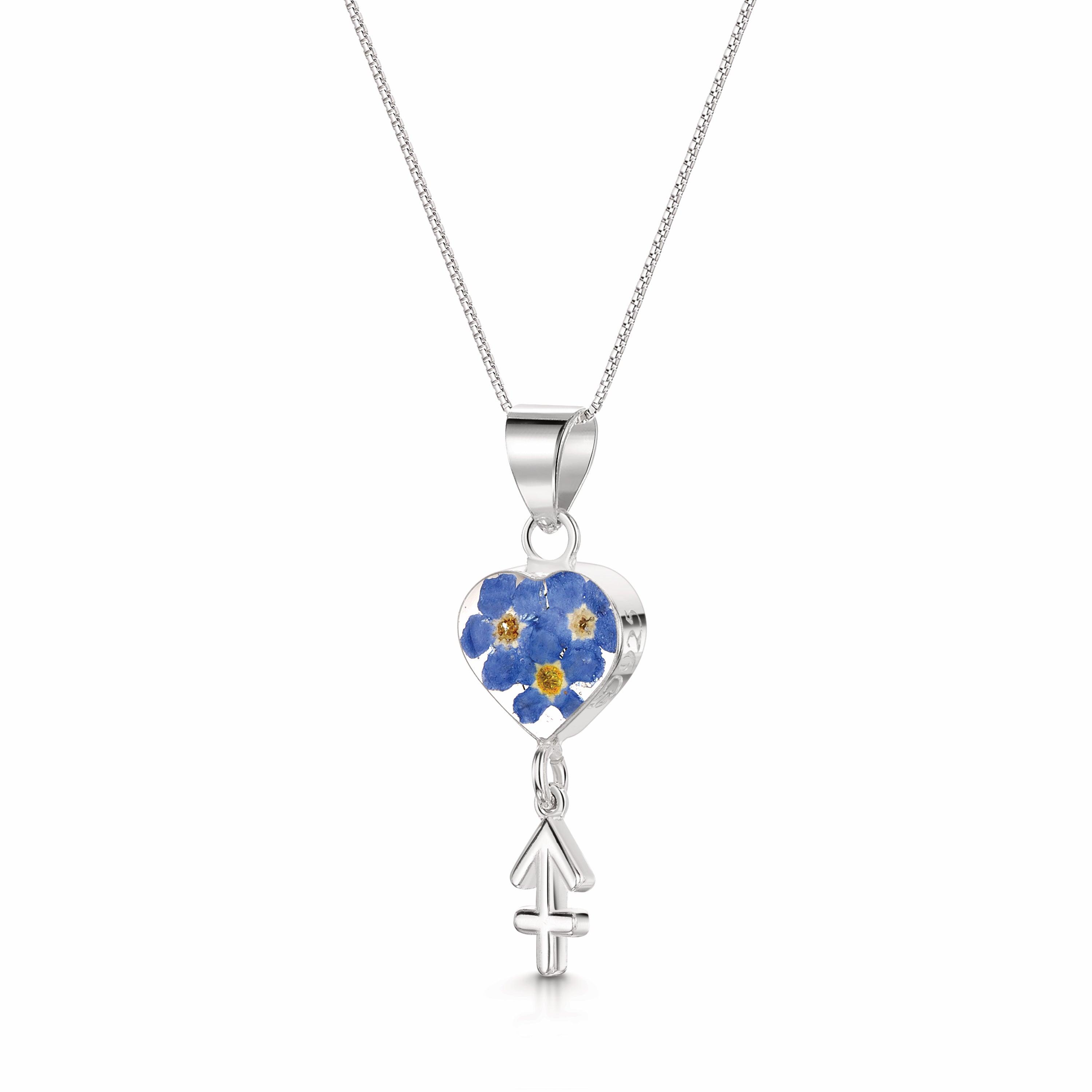 Sagittarius Necklace featuring a sterling silver pendant with real flowers and a detailed zodiac charm, showcasing elegance and individuality.