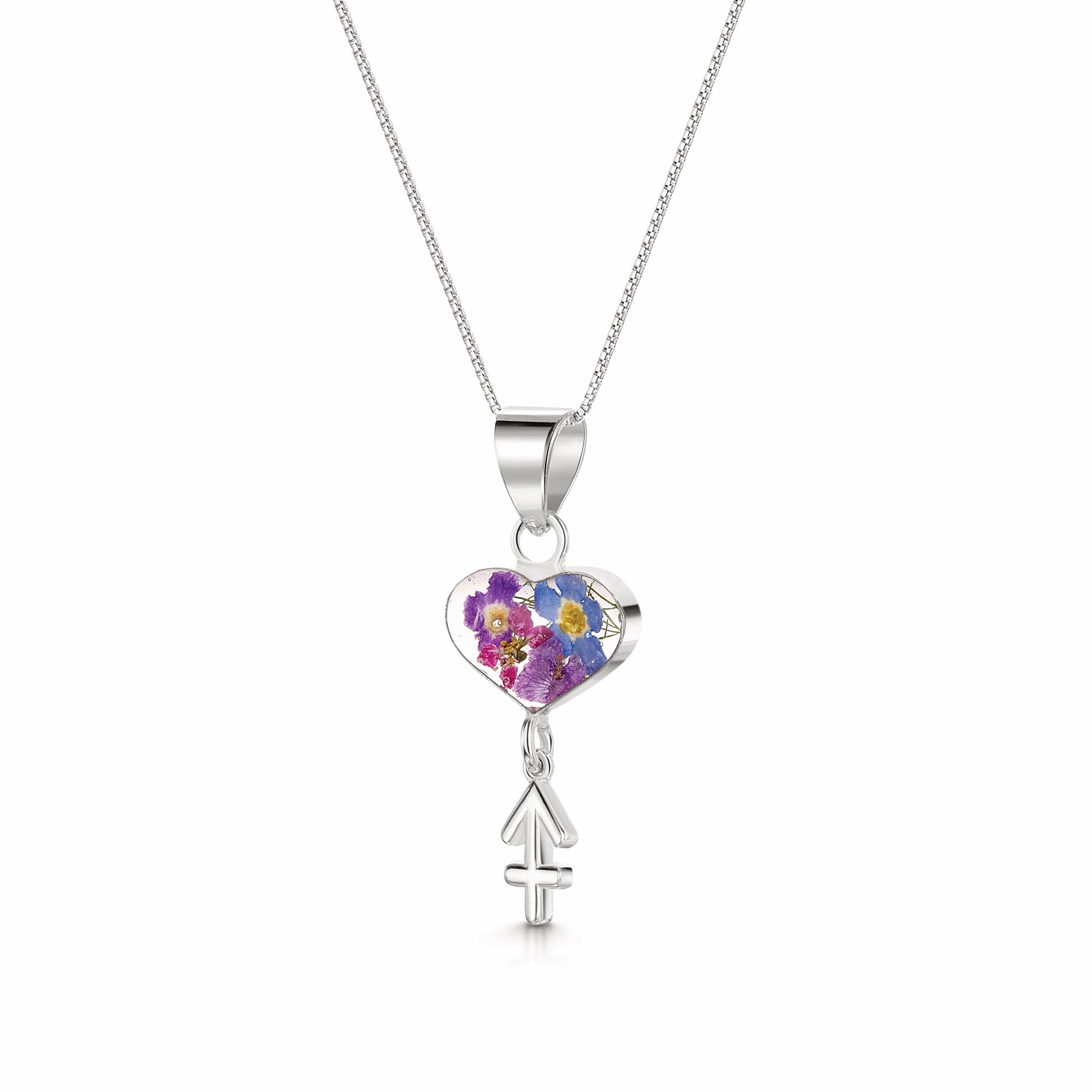 Sagittarius Necklace featuring a sterling silver pendant with real flowers and a detailed zodiac charm, showcasing elegance and individuality.