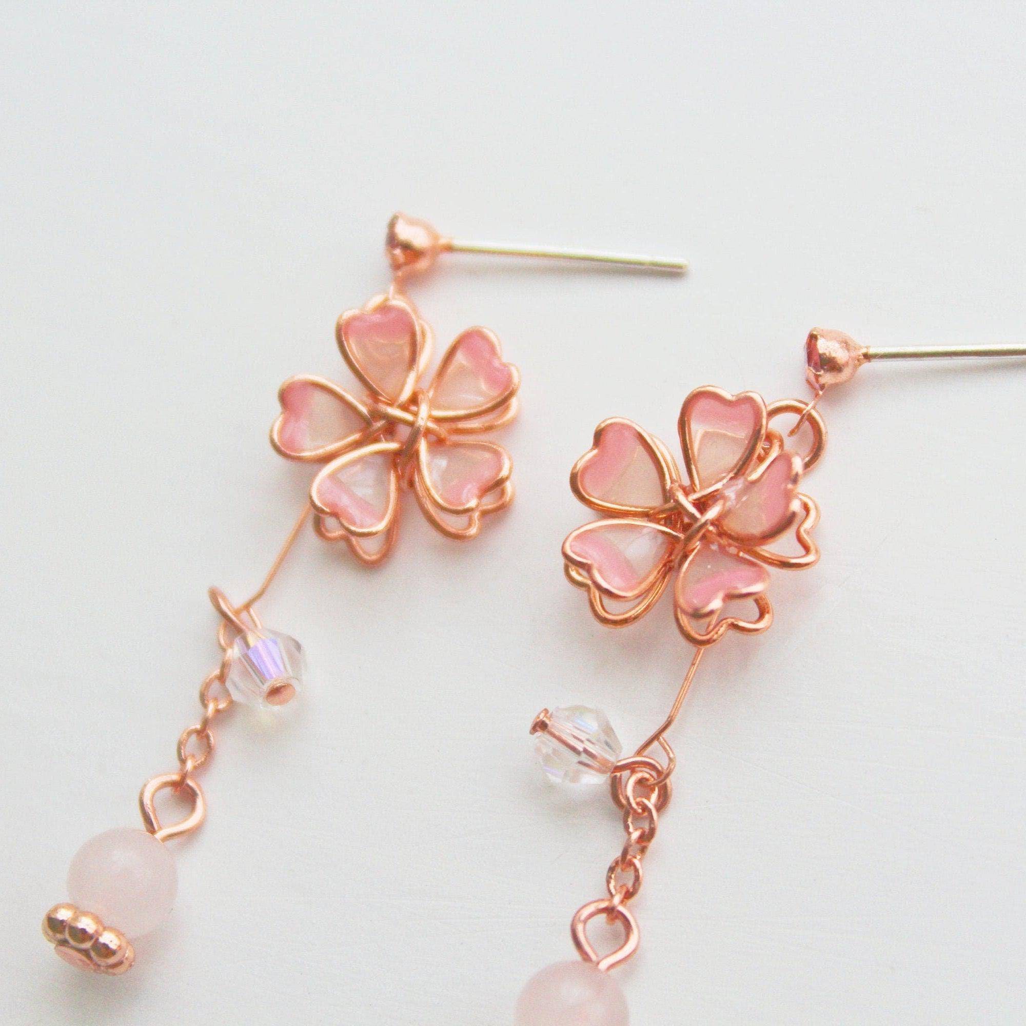 Sakura Flower Earrings featuring pink cherry blossoms and crystal drops, handmade with rose gold wire and sterling silver studs.