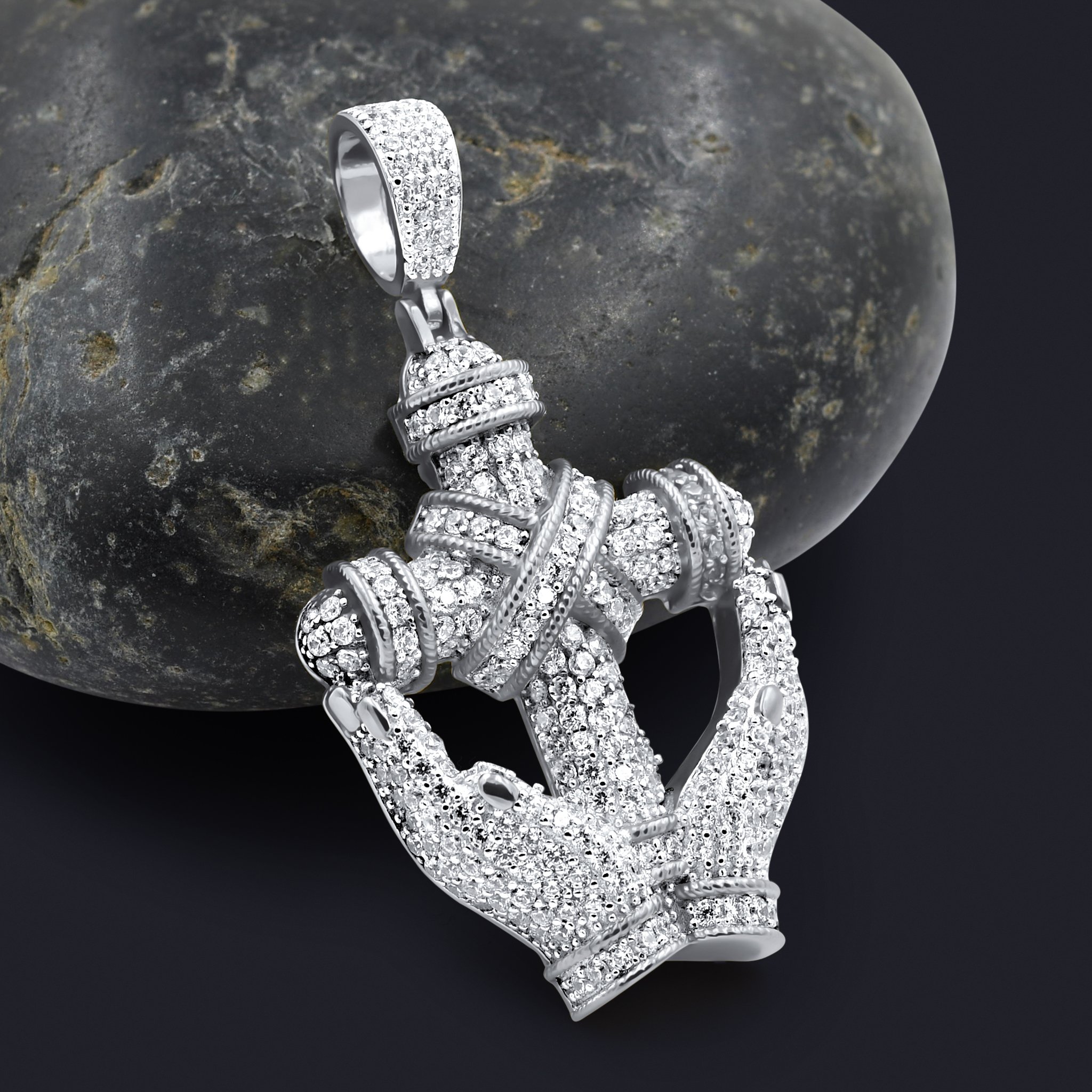 SANCTITUDE Pendant featuring a cross design embellished with cubic zircon stones, crafted from 925 sterling silver.