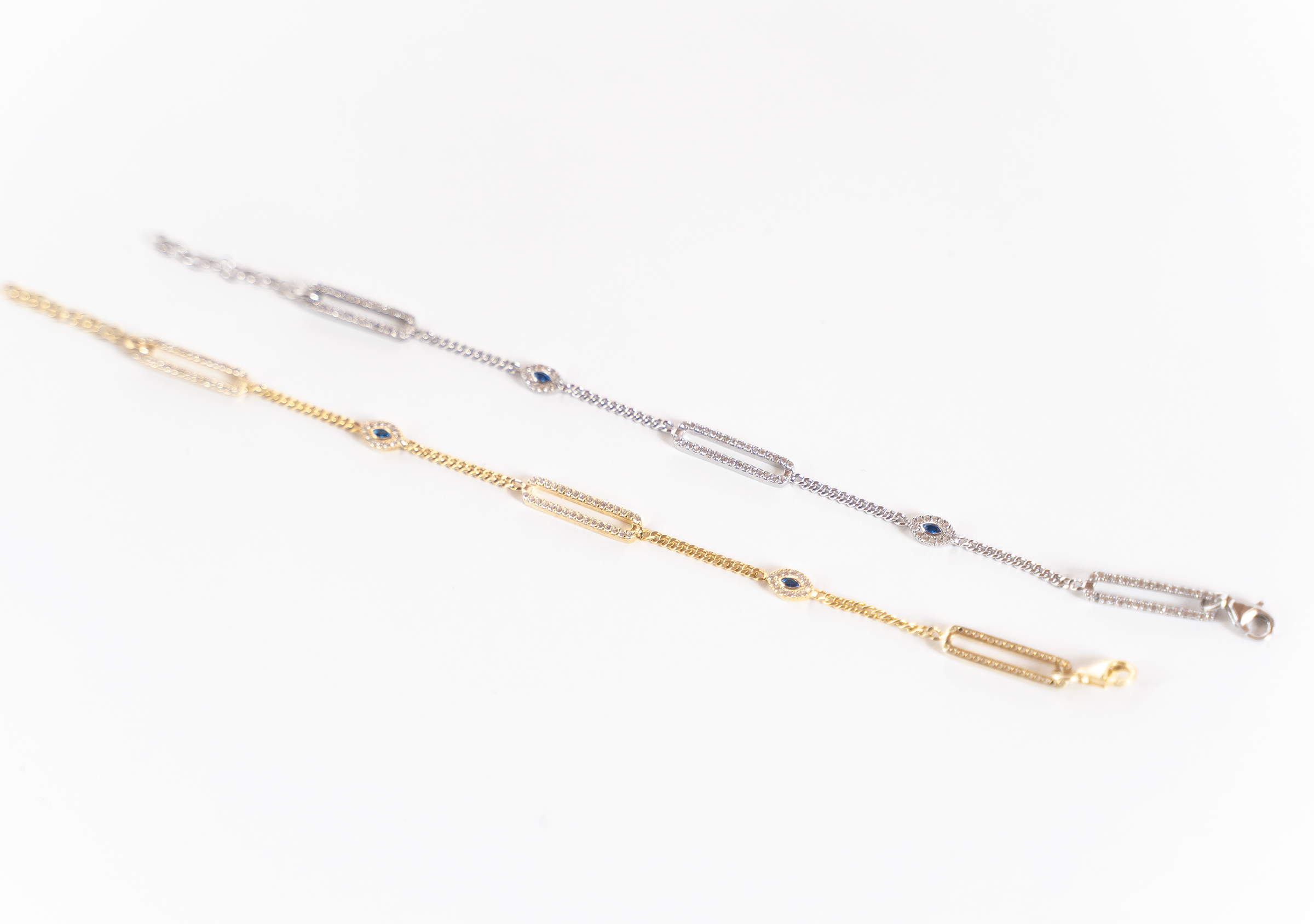 SANEM Bracelet featuring evil eye charms and cubic zirconia on a delicate sterling silver chain.