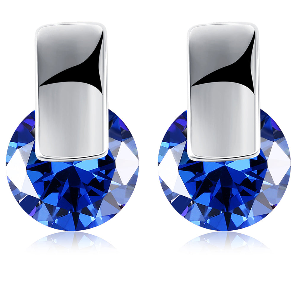 Elegant sapphire stud earrings set in 18K white gold plating, showcasing a rich blue color and a comfortable design.