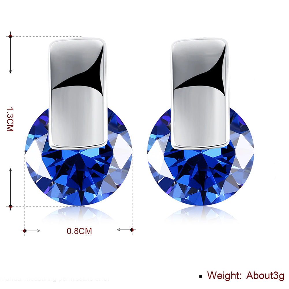 Elegant sapphire stud earrings set in 18K white gold plating, showcasing a rich blue color and a comfortable design.