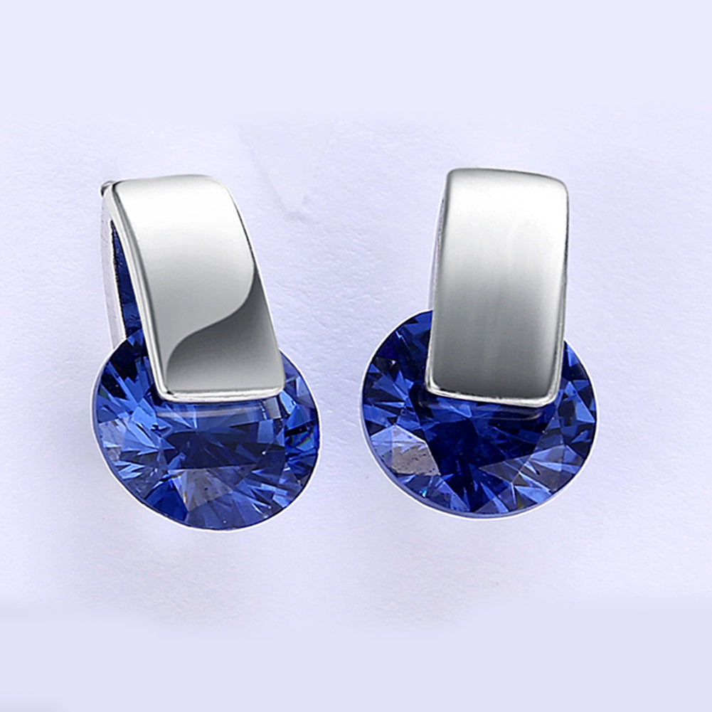 Elegant sapphire stud earrings set in 18K white gold plating, showcasing a rich blue color and a comfortable design.