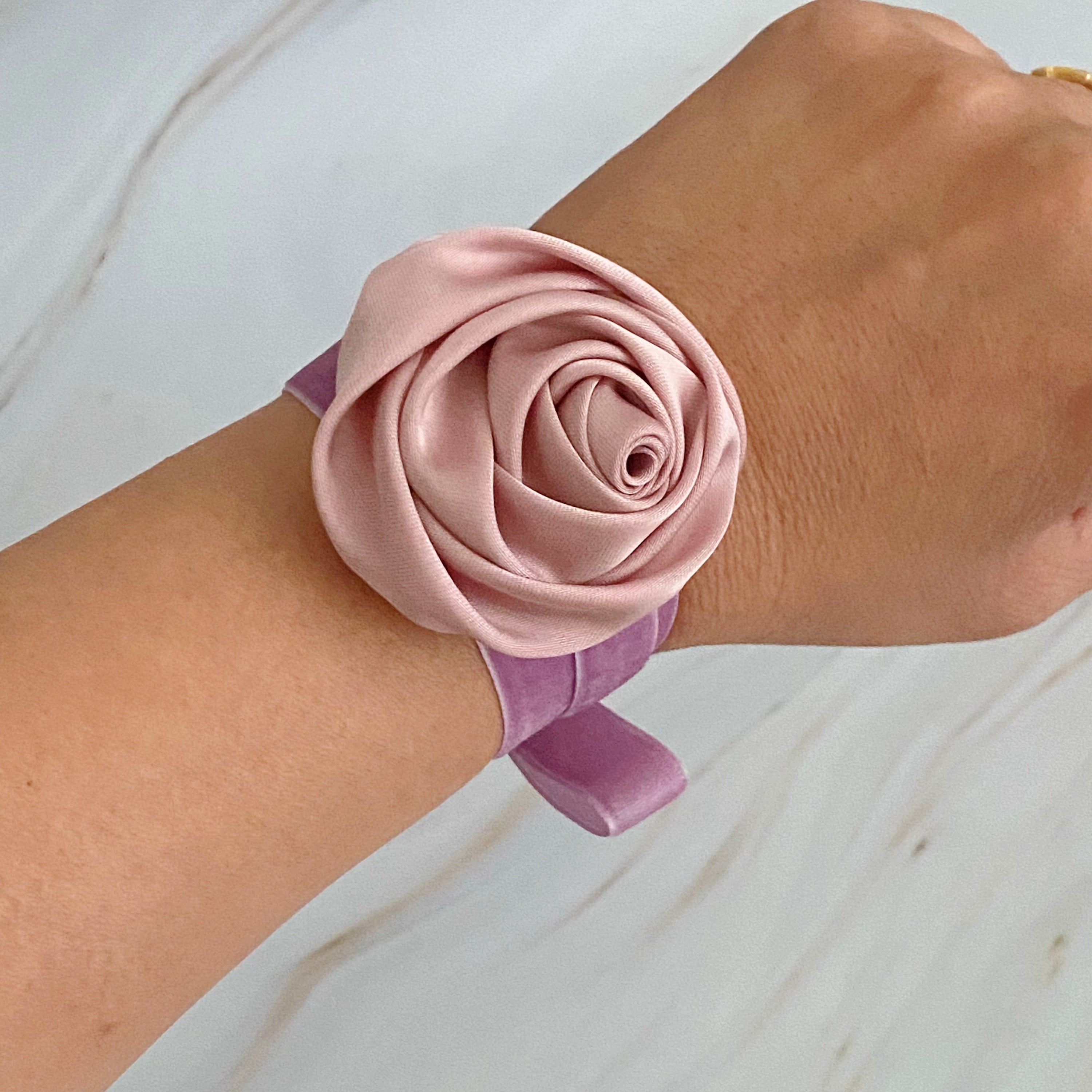 A beautifully crafted Satin Rose Velvet Sash Necklace with a soft velvet tie, showcasing its versatility as a choker, bracelet, or hair accessory.