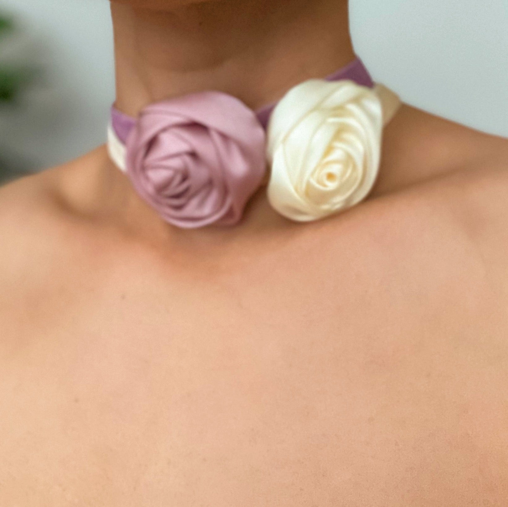 A beautifully crafted Satin Rose Velvet Sash Necklace with a soft velvet tie, showcasing its versatility as a choker, bracelet, or hair accessory.