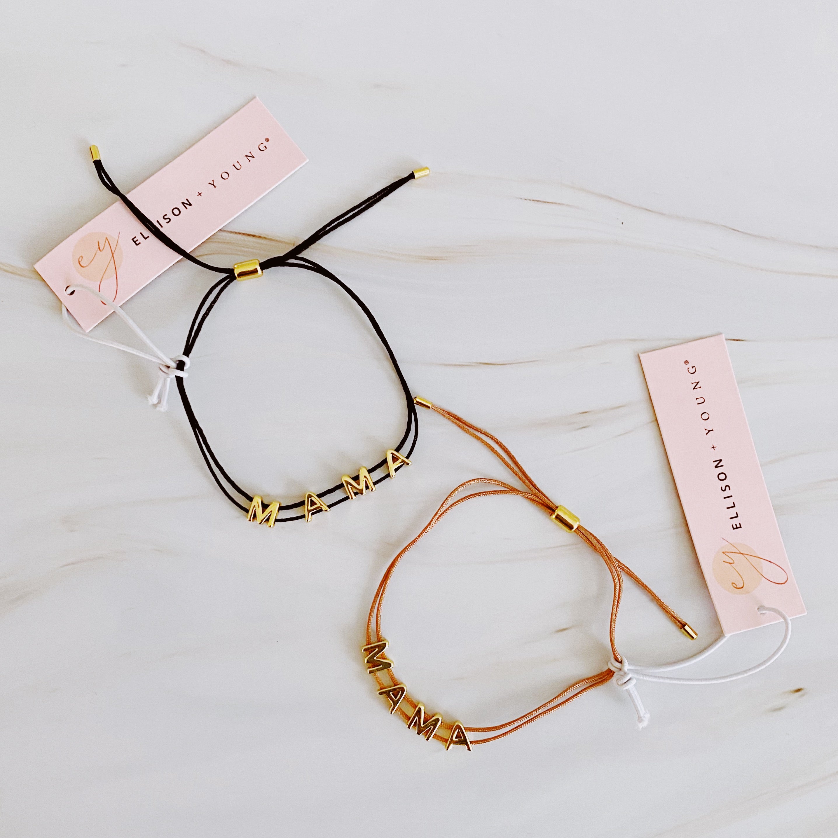 A stylish Satin Thread Mama Bracelet featuring a slim satin thread with golden 'MAMA' lettering, adjustable for a perfect fit.