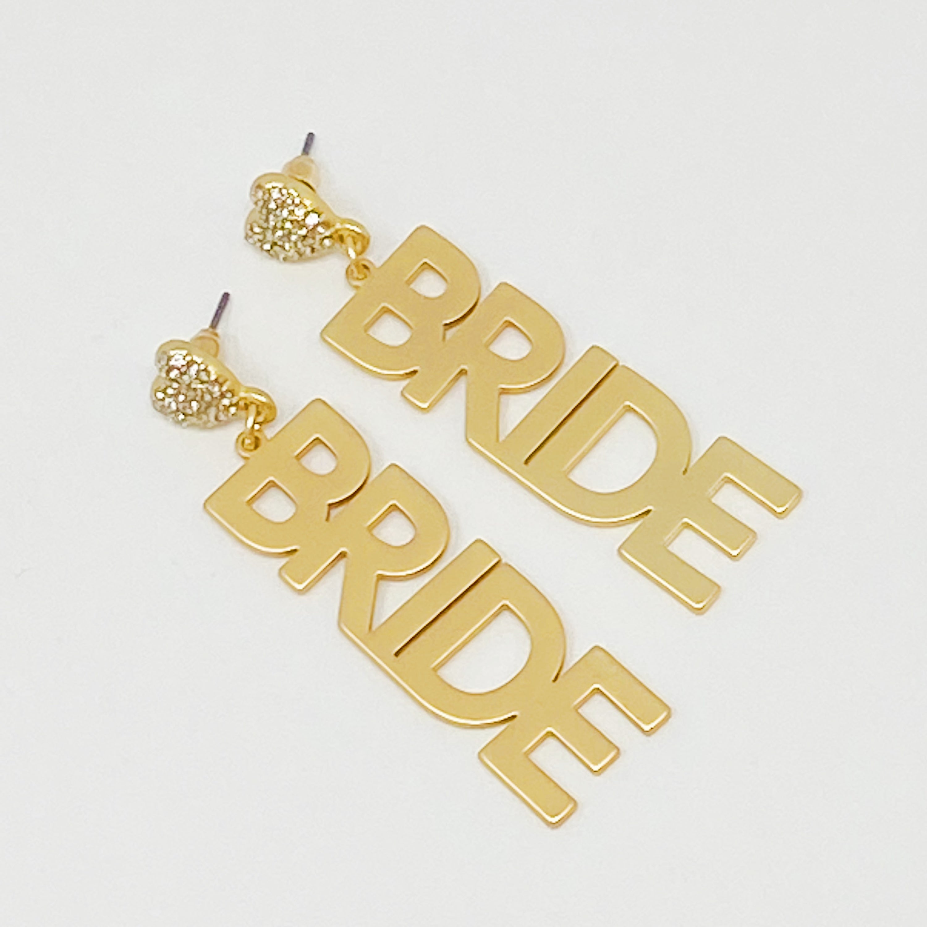 Elegant gold plated brass earrings designed for brides, featuring a stylish and modern look, perfect for weddings and bachelorette parties.