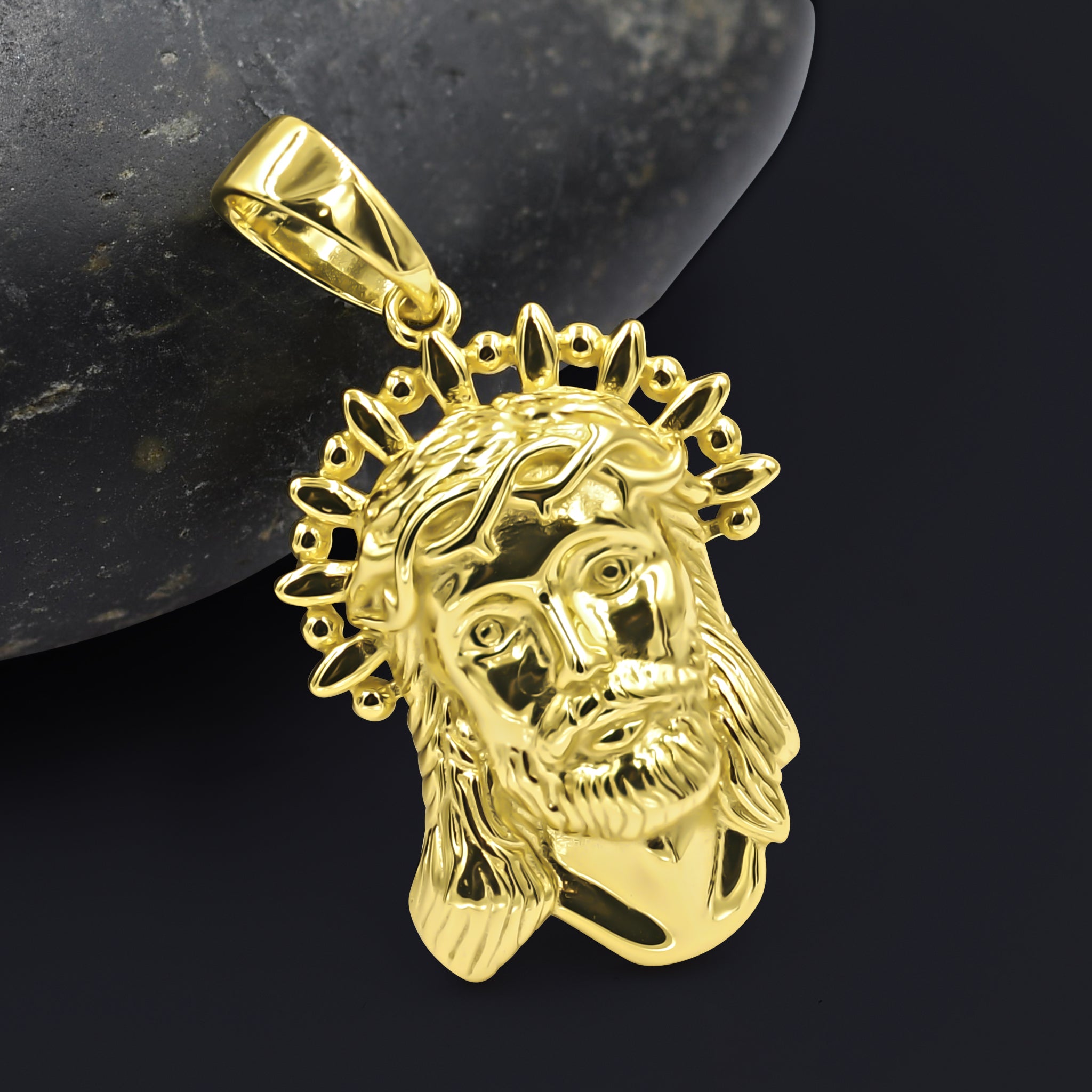 SCHILD Sterling Silver Pendant featuring an intricately sculpted portrait of Jesus, adorned with cubic zircon stones.