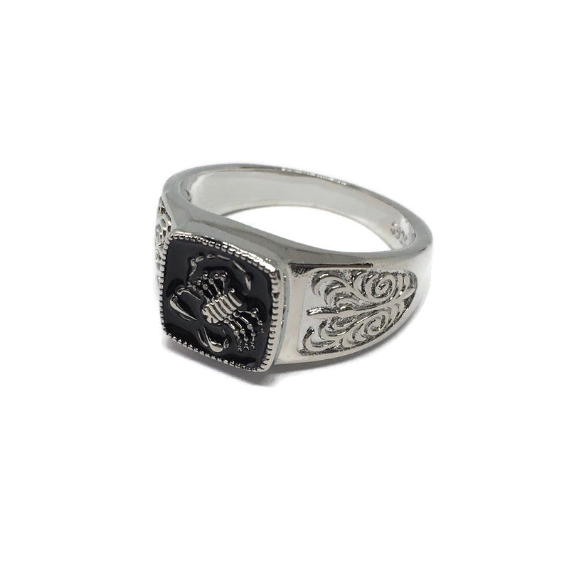 A stylish Scorpion Paisley Band Ring made of sterling silver plated steel alloy, featuring an intricate paisley design suitable for unisex wear.