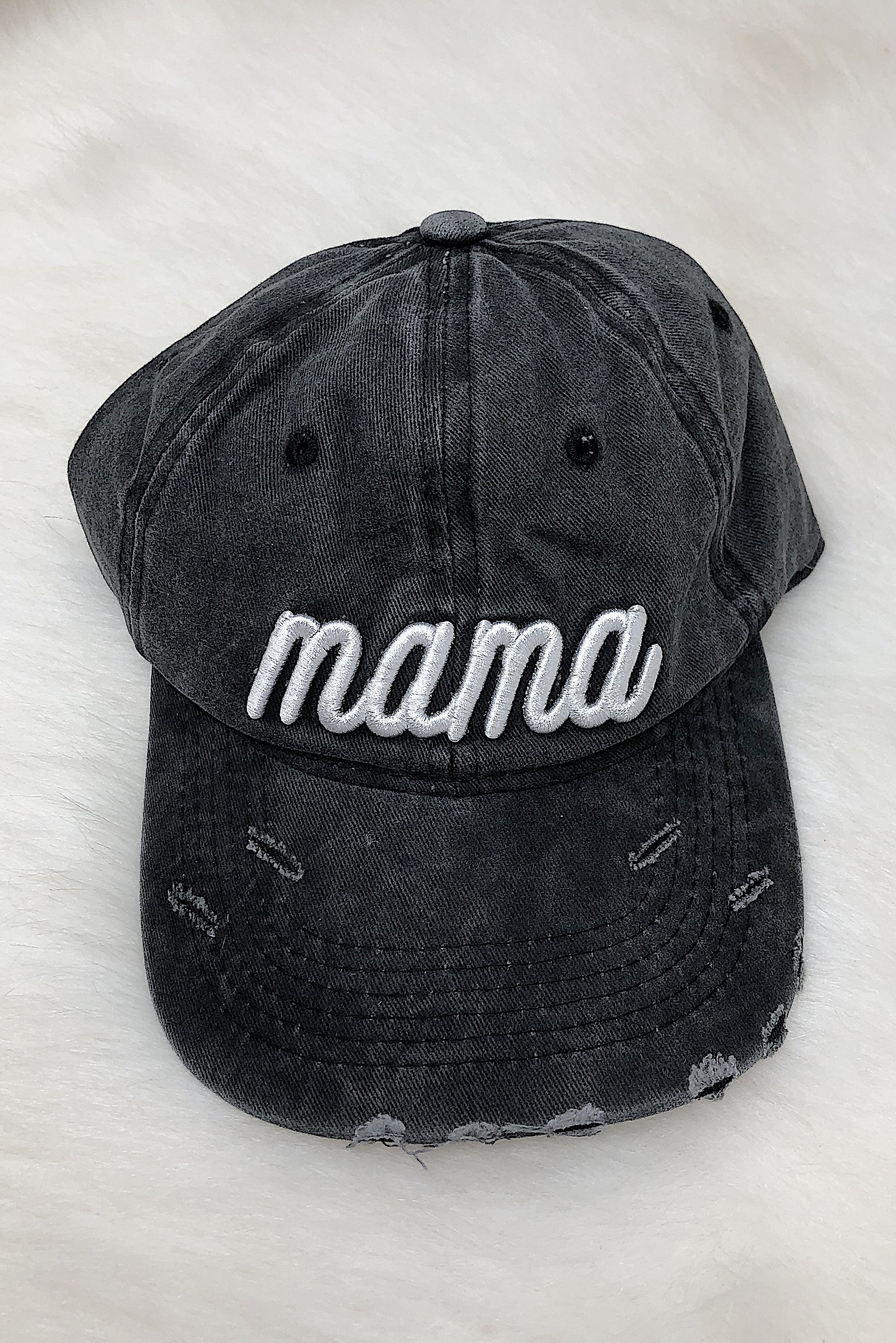 Dark gray distressed baseball cap with white 'Mama' embroidery and adjustable strap.