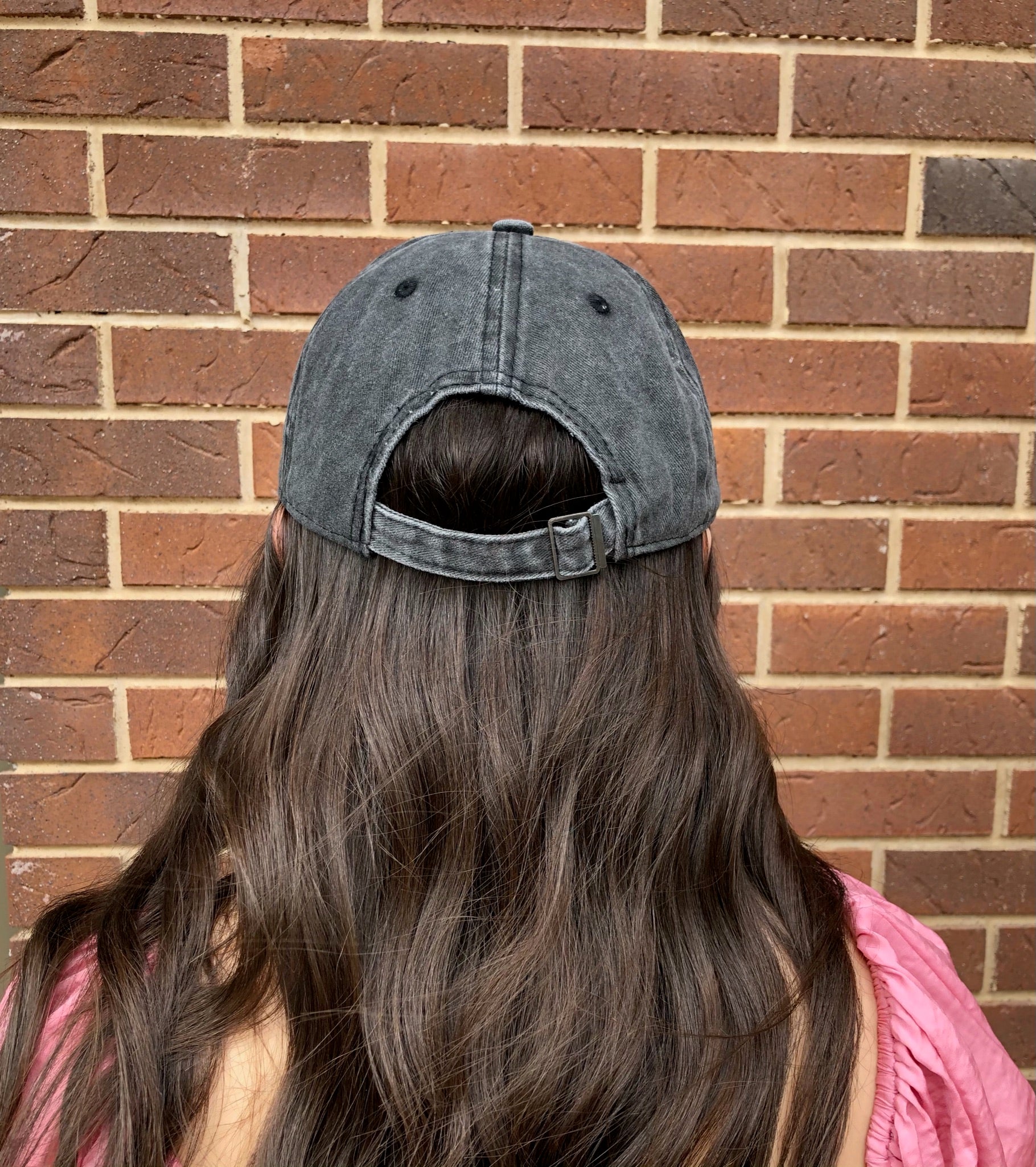 Dark gray distressed baseball cap with white 'Mama' embroidery and adjustable strap.