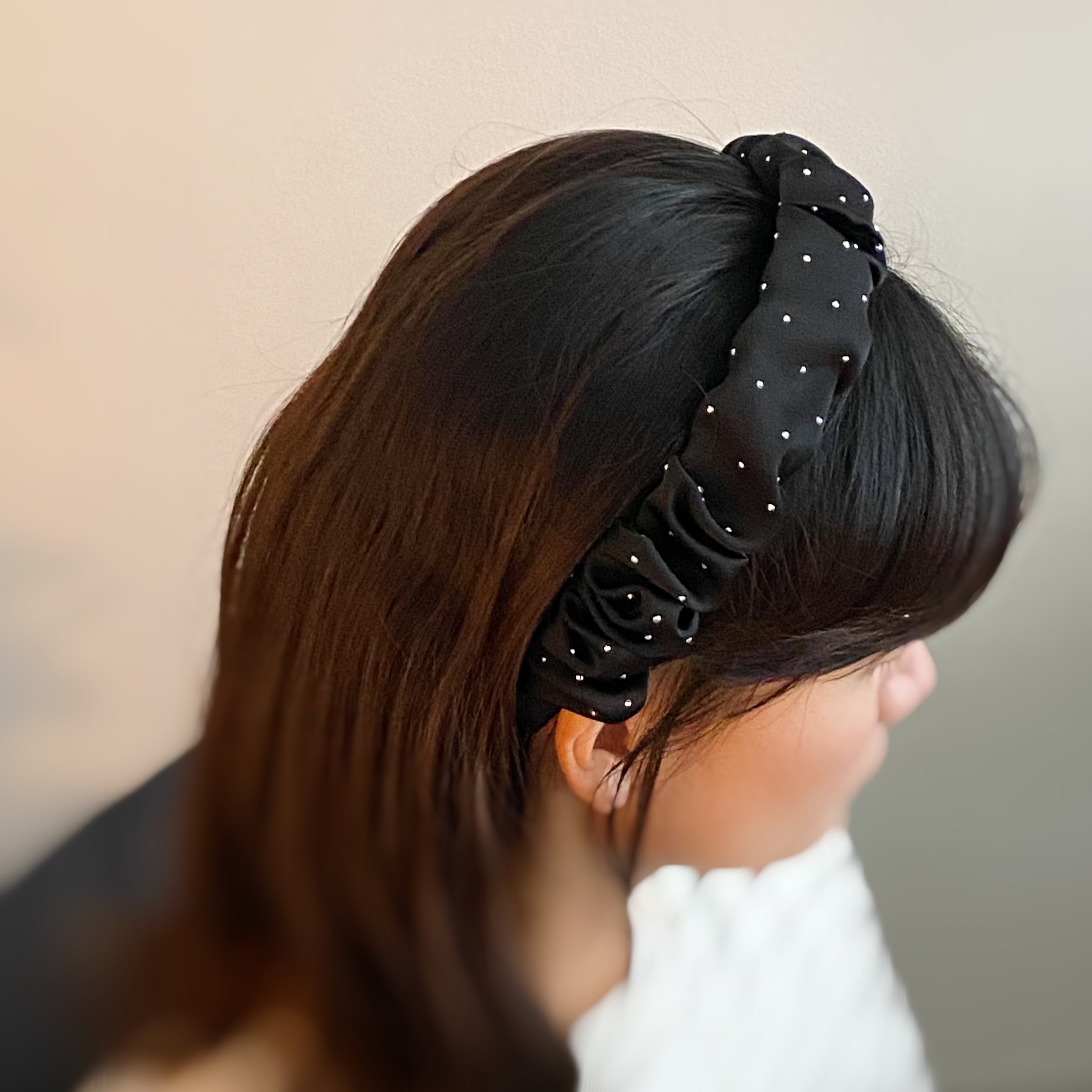 Scrunched Satin Jewel Dotted Headband featuring elegant satin fabric with sparkly jewel dots, perfect for stylish outfits.