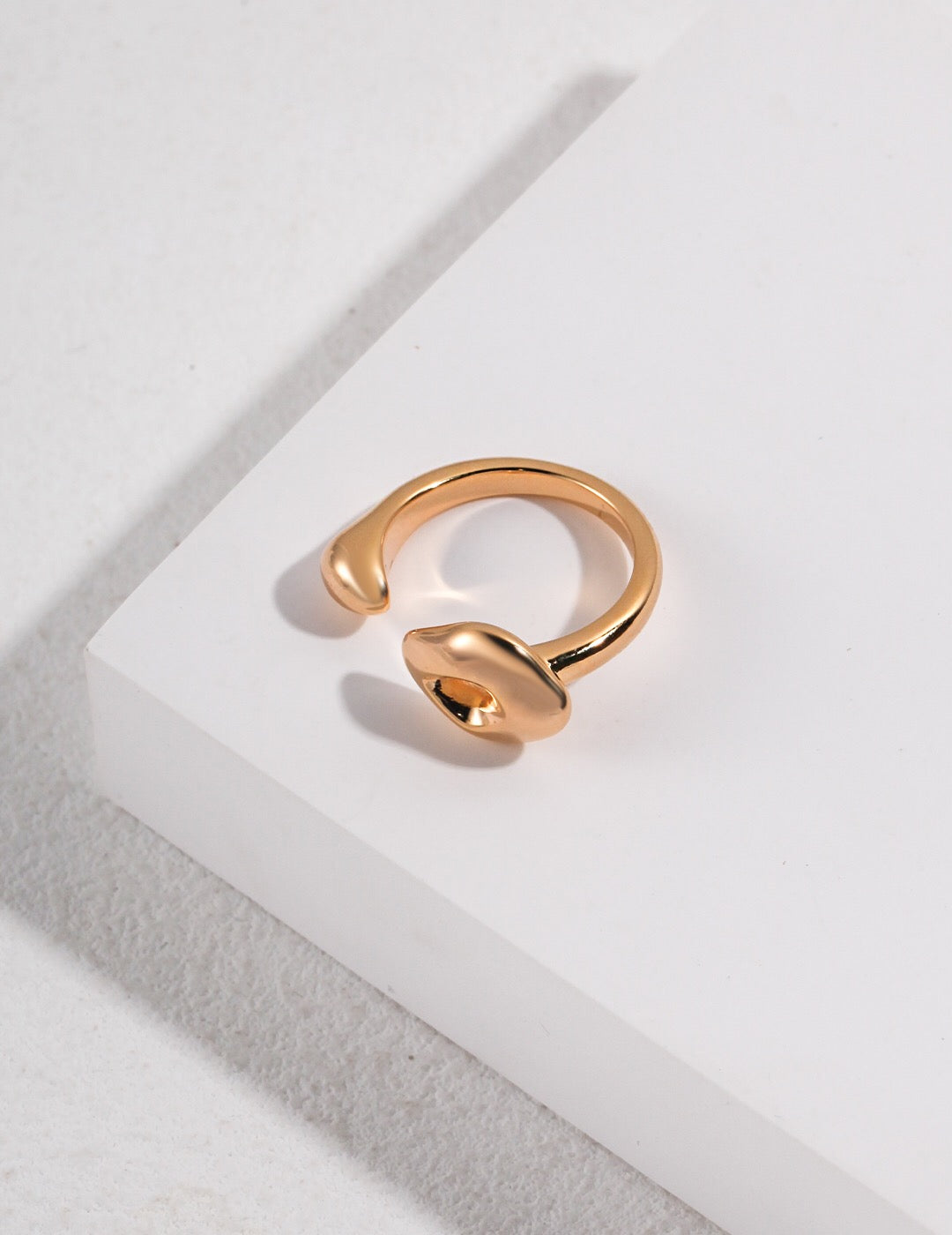 Sculptural Style Open Ring in gold vermeil, showcasing its elegant design and adjustable fit.