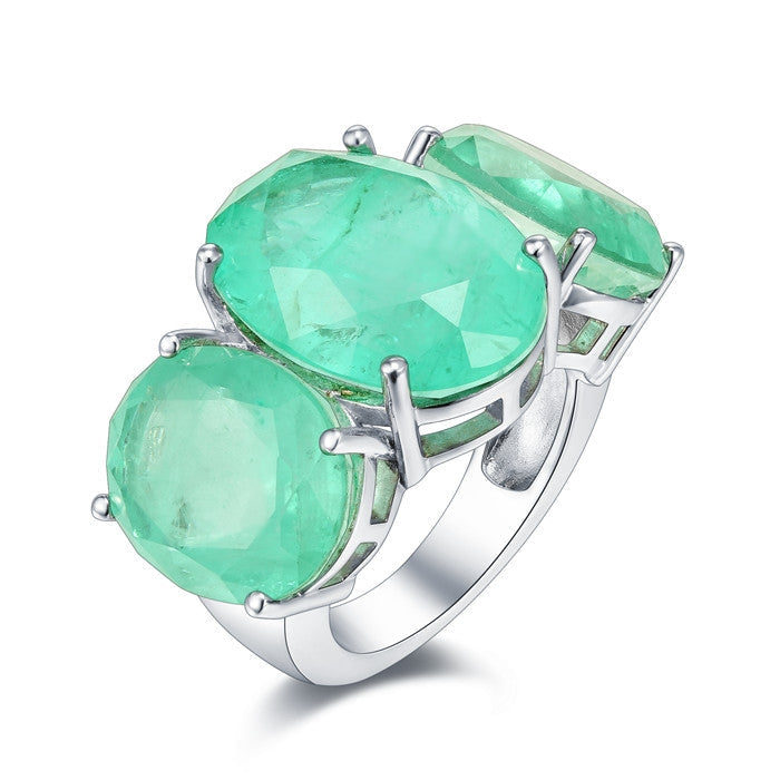 A beautiful See Blue Paraiba Fantastic Ring made of 925 sterling silver with real white gold, featuring three oval Paraiba stones.