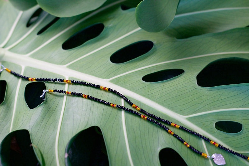 Colorful seed bead bracelet and anklet set, showcasing vibrant patterns and customizable designs.