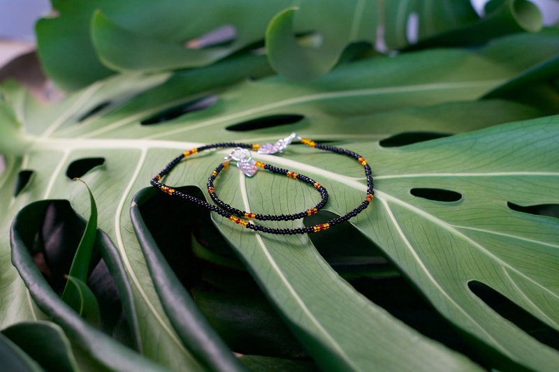 Colorful seed bead bracelet and anklet set, showcasing vibrant patterns and customizable designs.