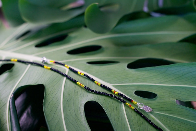 Colorful seed bead bracelet and anklet set, showcasing vibrant patterns and customizable designs.