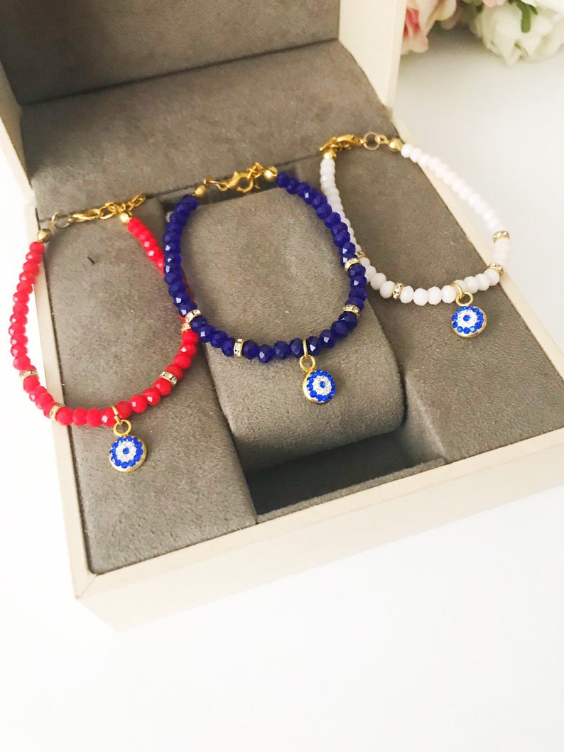 Handmade Evil Eye Bracelet featuring colorful Miyuki seed beads and an evil eye charm for protection.