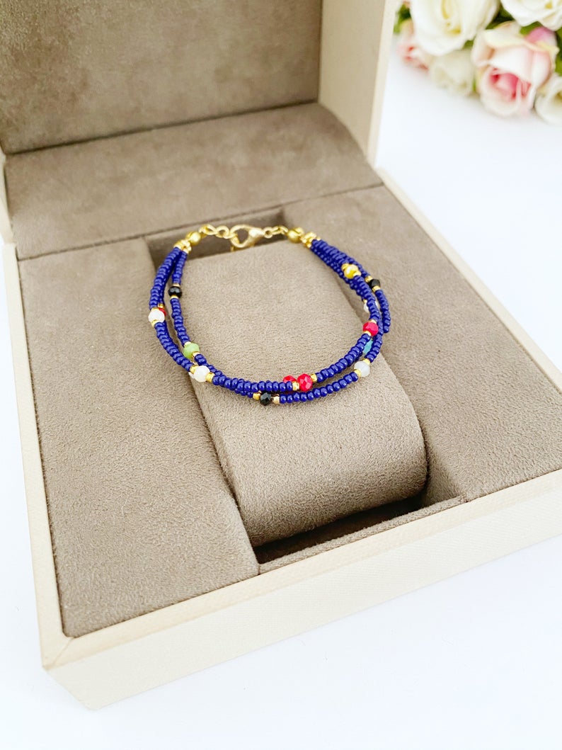 Handmade Seed Beads Bracelet featuring blue, white, and red Miyuki beads, showcasing a dainty and stylish design.