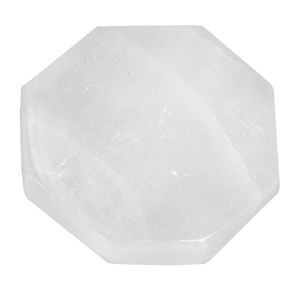 Hexagon-shaped Selenite Charging Table for cleansing and recharging gemstones, featuring a smooth, translucent surface.