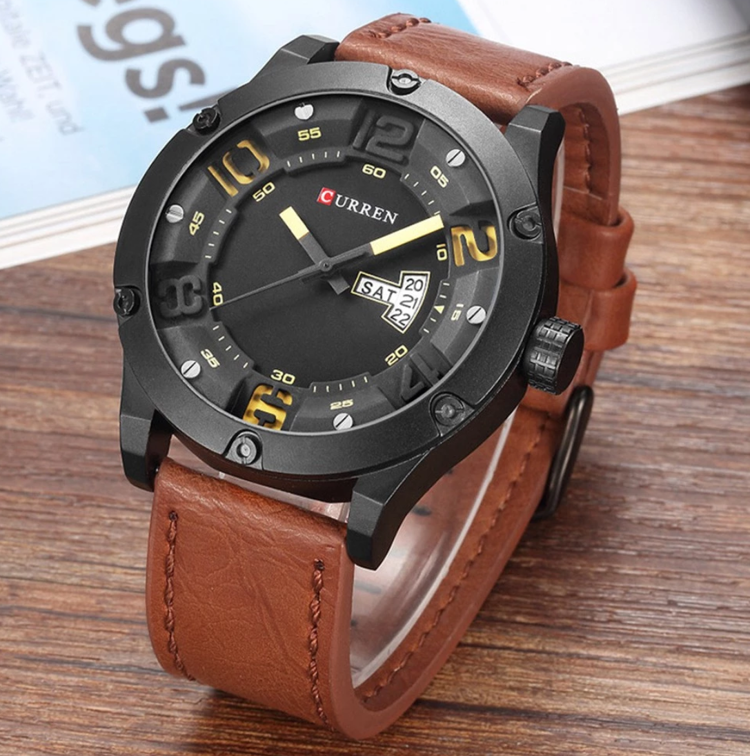 SENSATIONAL Curren Leather watch featuring a black steel cover and yellow accents on the hands, with a stylish leather strap.