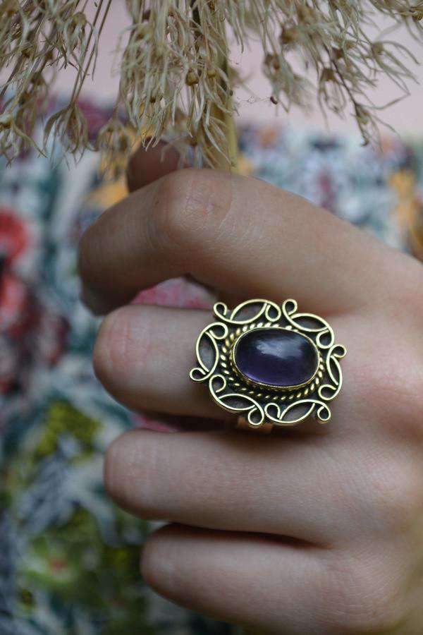 A detailed image of the Sensual Stone Ring featuring a semi-precious stone set in an intricate brass design, showcasing its elegance and craftsmanship.