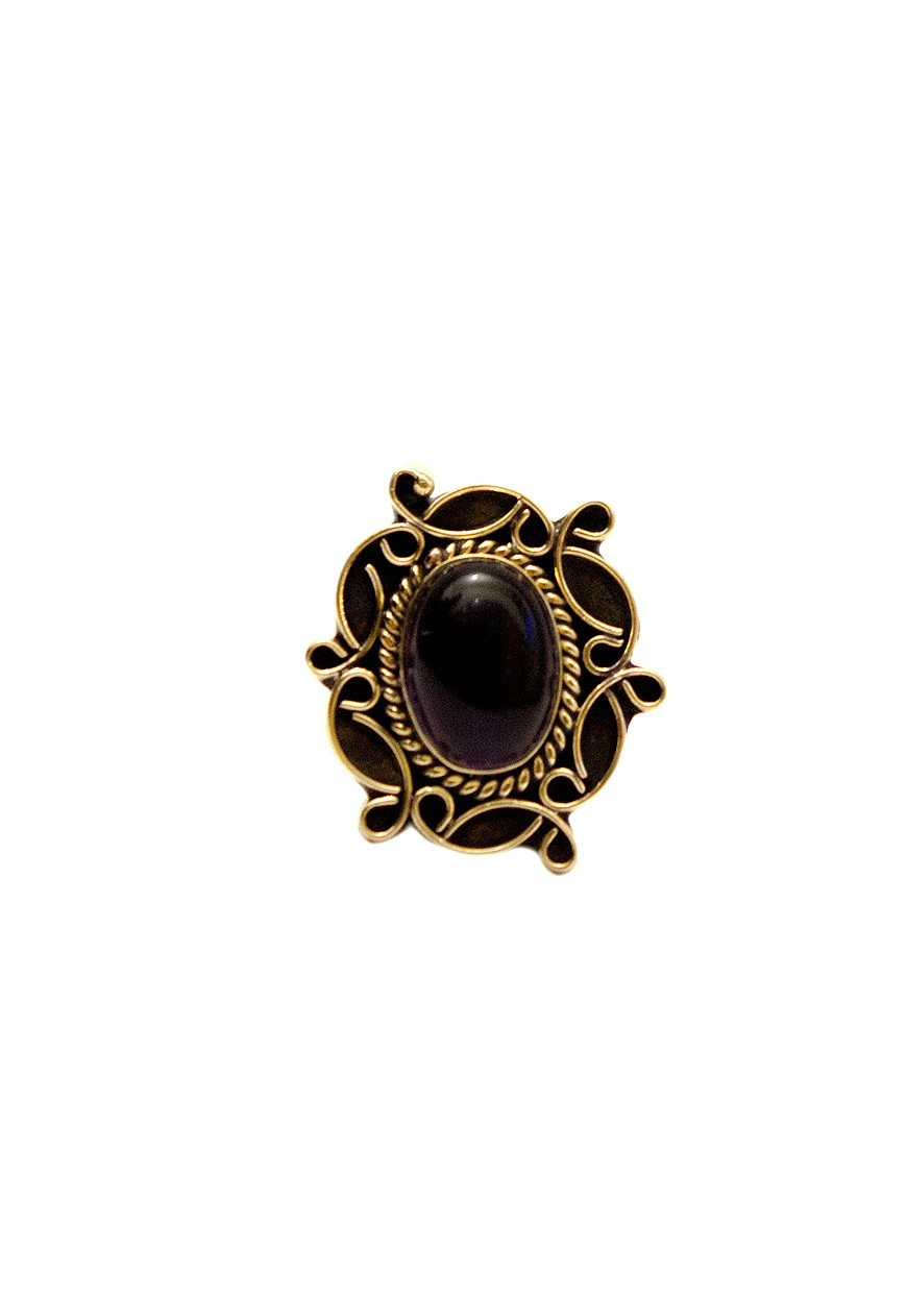 A detailed image of the Sensual Stone Ring featuring a semi-precious stone set in an intricate brass design, showcasing its elegance and craftsmanship.