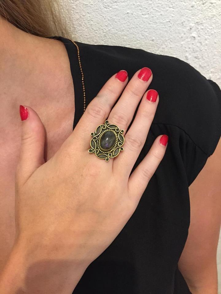 A detailed image of the Sensual Stone Ring featuring a semi-precious stone set in an intricate brass design, showcasing its elegance and craftsmanship.