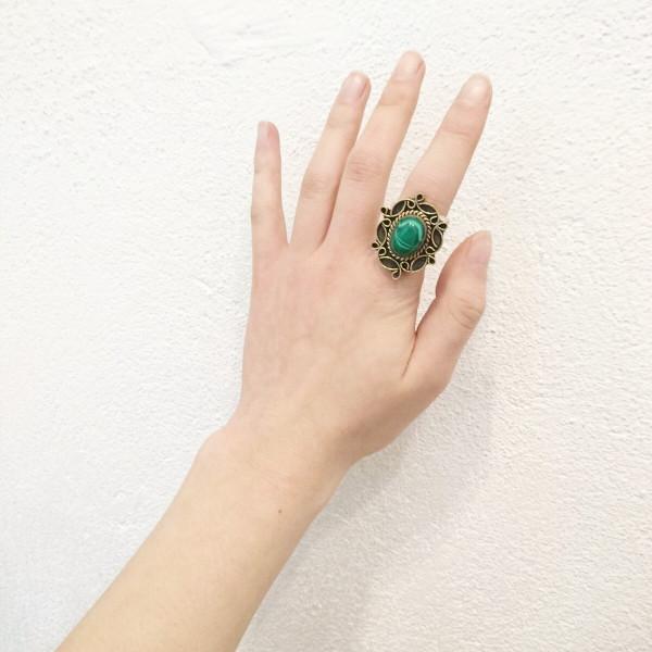 A detailed image of the Sensual Stone Ring featuring a semi-precious stone set in an intricate brass design, showcasing its elegance and craftsmanship.