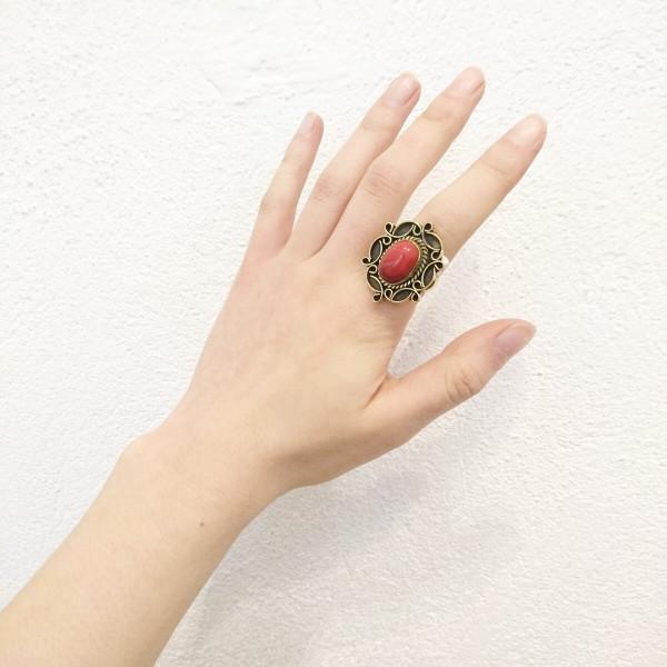 A detailed image of the Sensual Stone Ring featuring a semi-precious stone set in an intricate brass design, showcasing its elegance and craftsmanship.