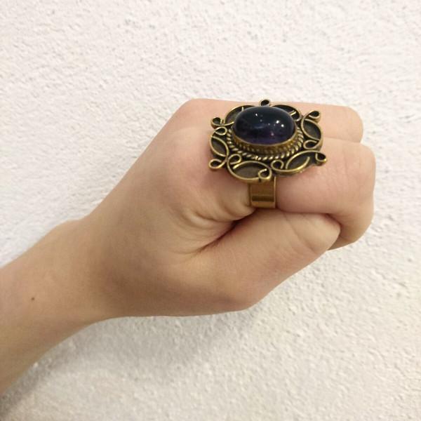 A detailed image of the Sensual Stone Ring featuring a semi-precious stone set in an intricate brass design, showcasing its elegance and craftsmanship.